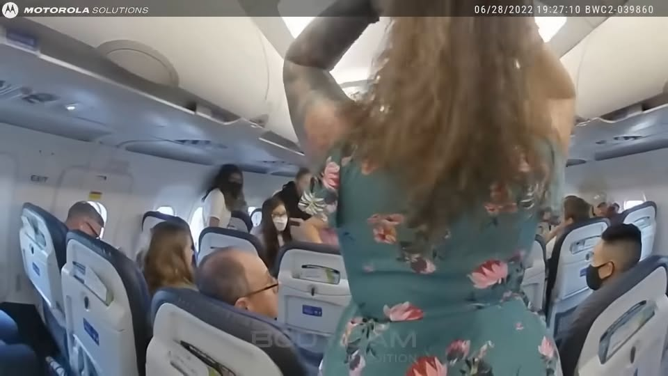 Disturbed Woman Kicked Off Airplane Outrageous V2808 023
