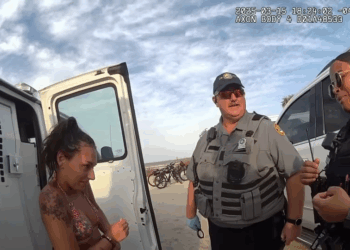 Young Couple Arrested On Their Way Home Beach V1110 010