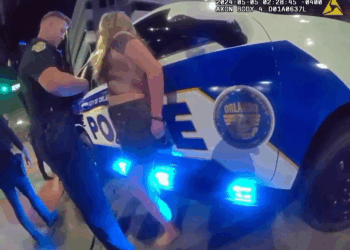 Young Woman Resists Arrest Following Street Fight V1110 029