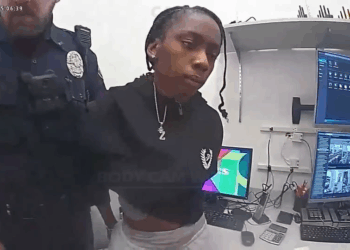 Cop Surprises Shoplifter Outside Changing Room V0411 013