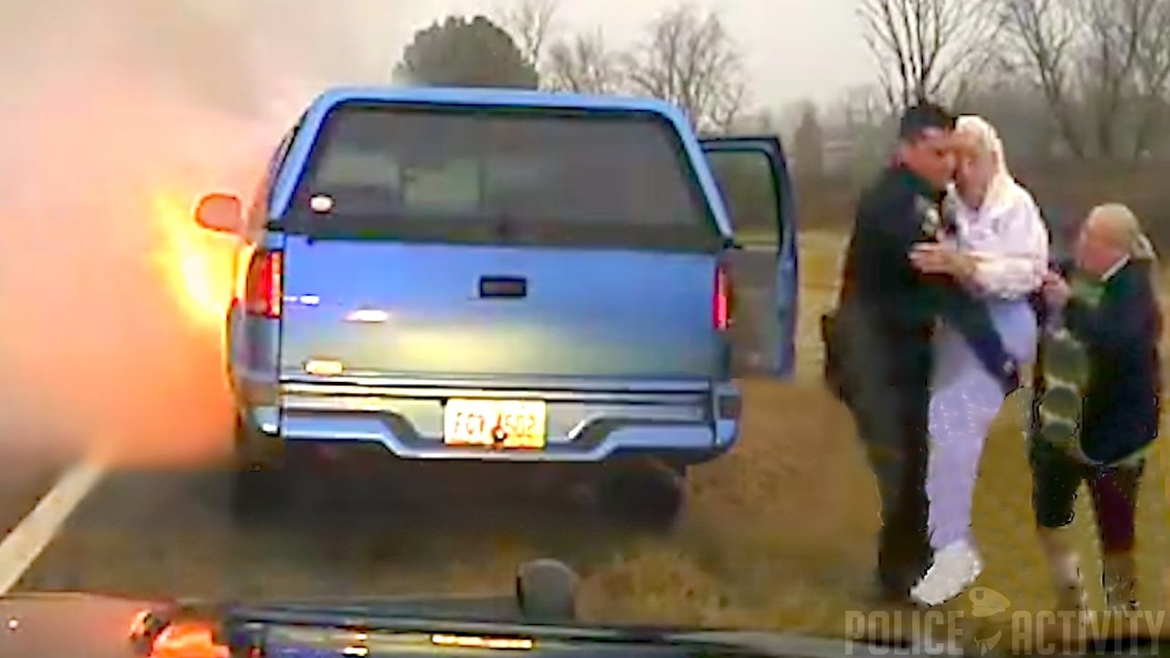 Officer Saves Woman and Her Elderly Mother From Burning Car